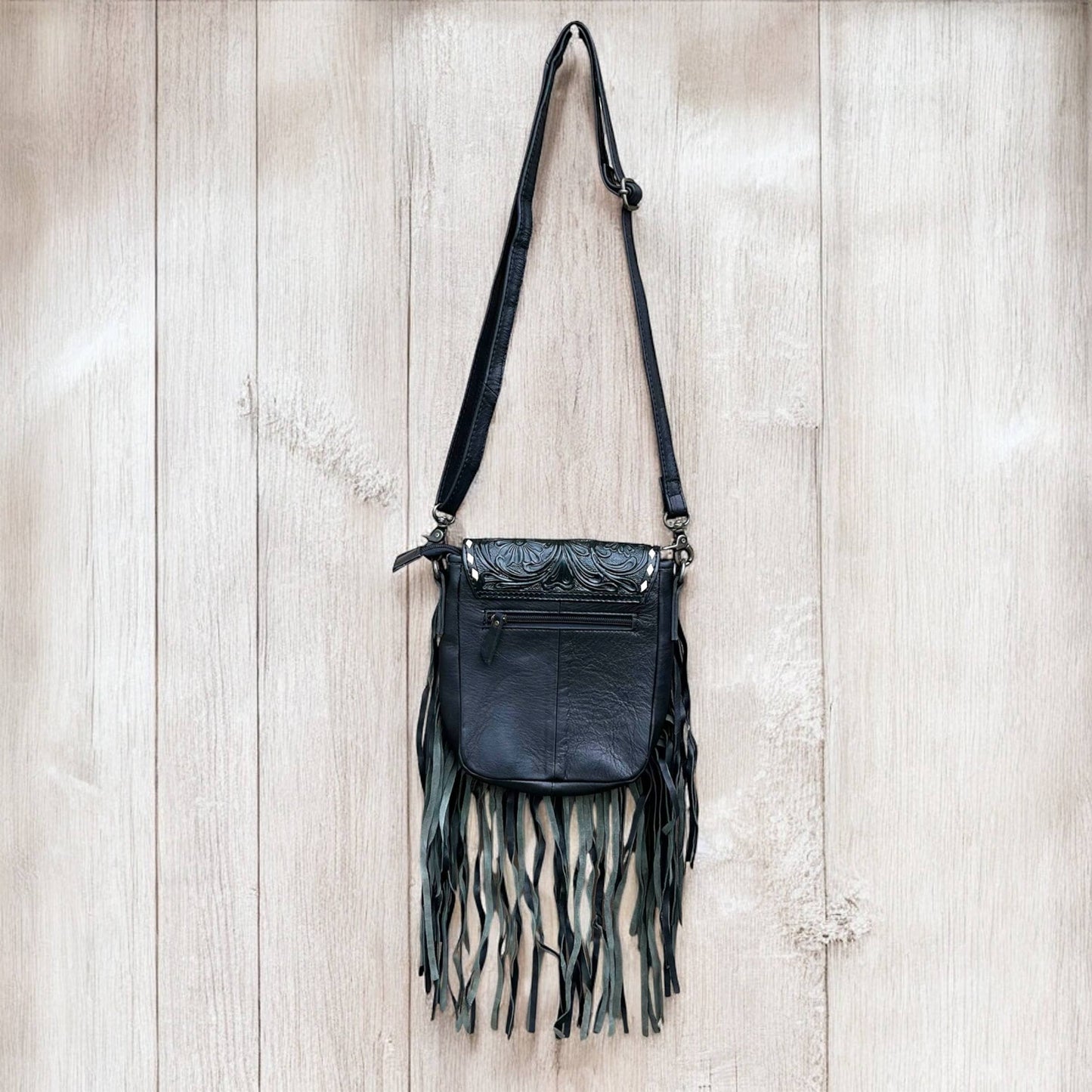 Cowhide conch fringe crossbody bag