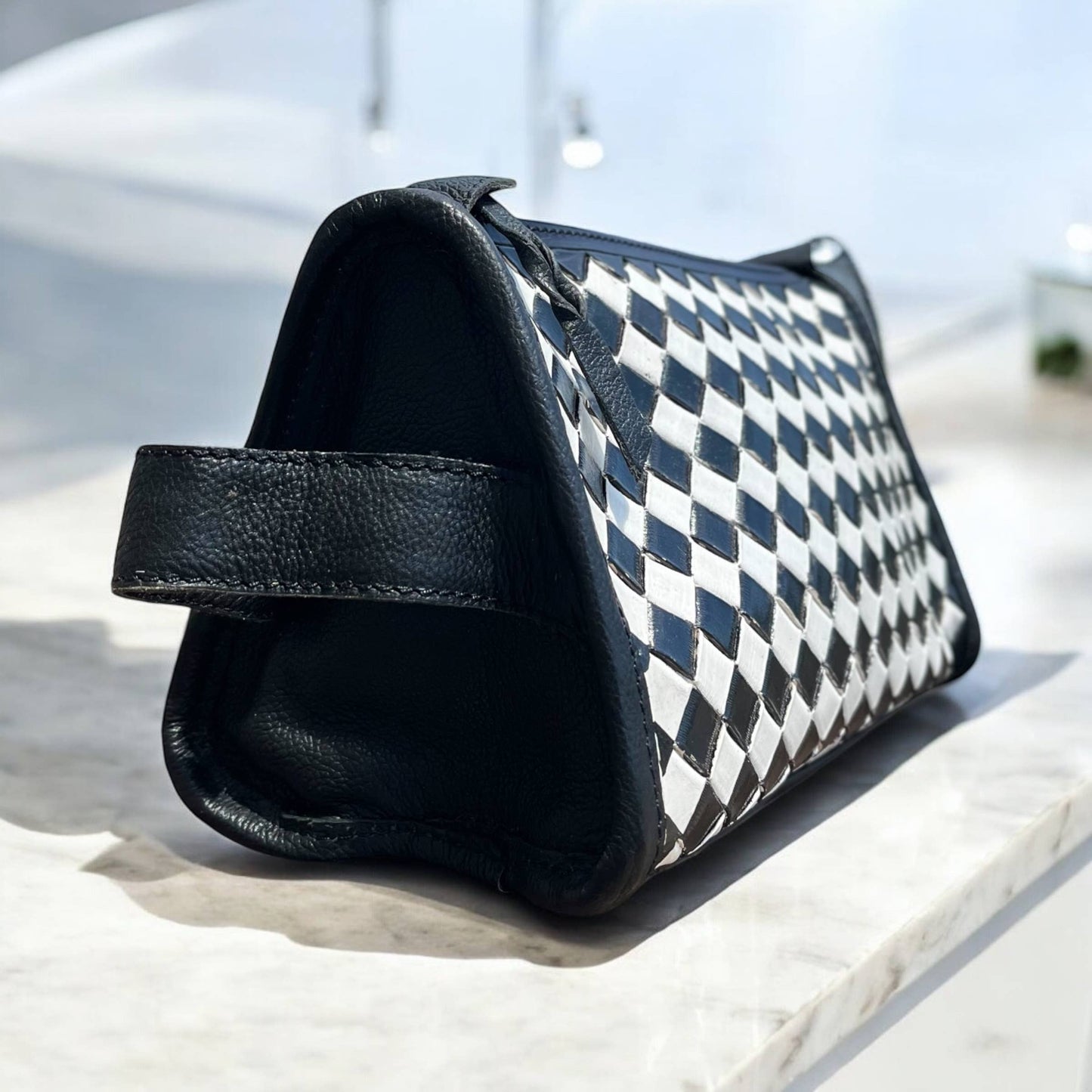 Checker leather toiletry bag