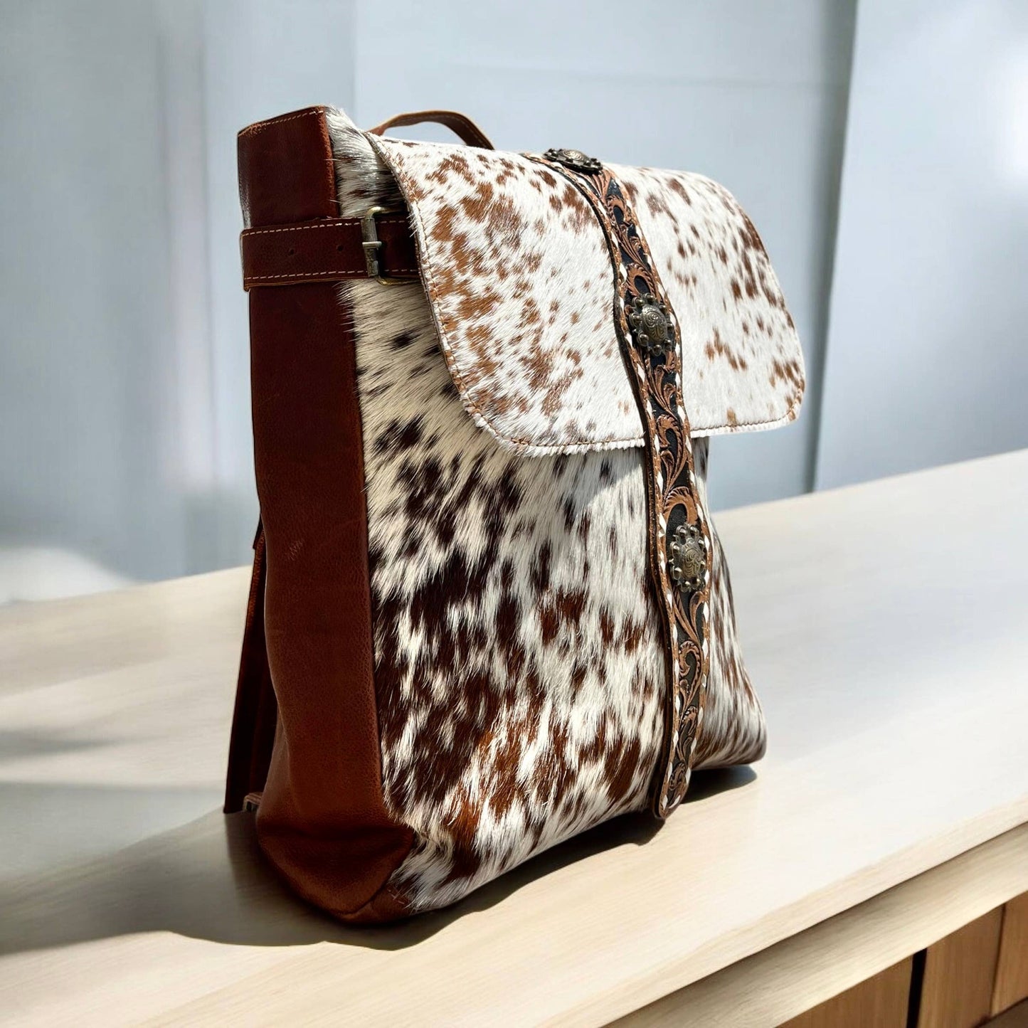 Cowhide & tooled leather backpack