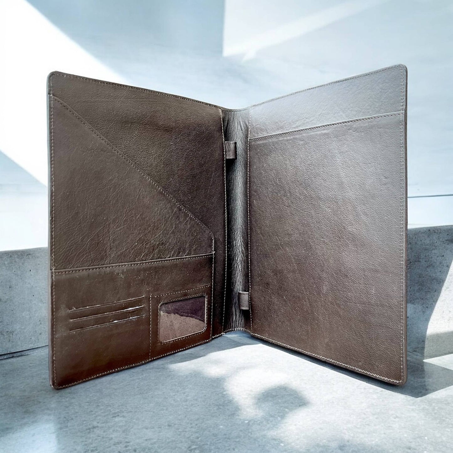 Vegas tooled leather & cowhide folder