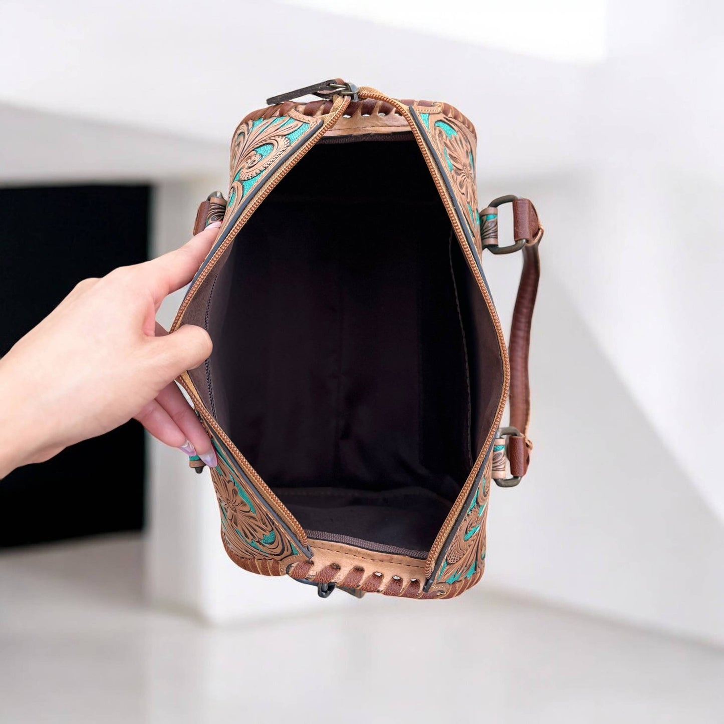 Tan tooled leather speedy bag 