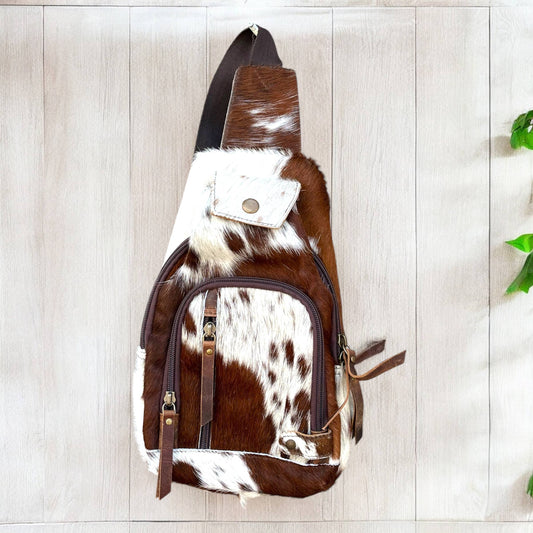 Tan all cowhide sling bag 
